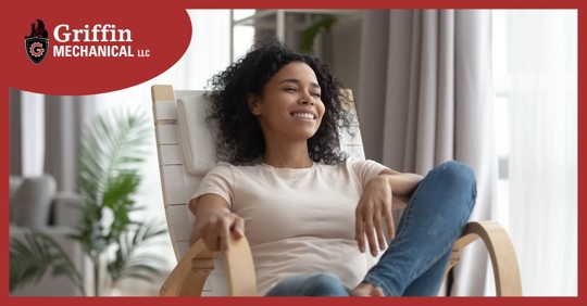 Woman relaxing in chair.